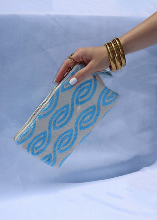 Light blue eye wave print wristlet clutch bag made in Greece. 100% cotton pouch made by Greek designer artisans