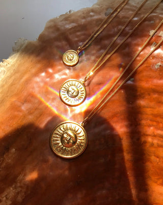 Gold-plated silver 925 sun charm necklace made in Greece by Barbora Jewelry, a Greek jewelry designer.