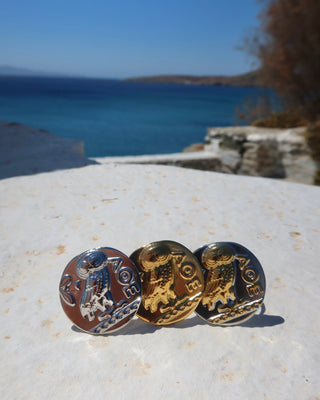 Silver, gold, and two tone rings featuring the athenian tetradrachm coin design with Ancient Greek goddess Athena's owl, a symbol of wisdom. Owl ring made in Greece, Greek jewelry