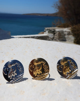 Silver, gold, and two tone rings featuring the athenian tetradrachm coin design with Ancient Greek goddess Athena's owl, a symbol of wisdom. Owl ring made in Greece, Greek jewelry