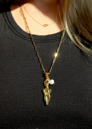 A gold-plated Cycladic figurine pendant necklace with an evil eye charm and a freshwater pearl on a chain made in Greece - Greek jewelry