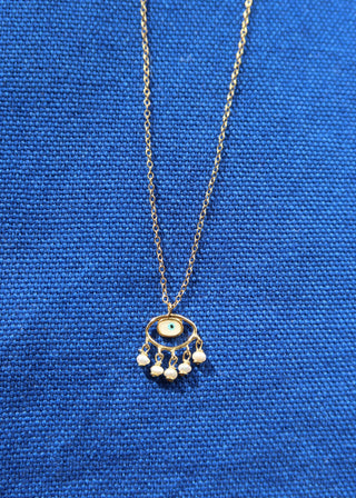 14k gold-plated sterling silver evil eye necklace with freshwater pearls handmade in Greece. Greek jewelry for protection, greek designer semi-fine jewelry