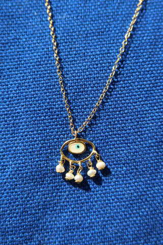 14k gold-plated sterling silver evil eye necklace with freshwater pearls handmade in Greece. Greek jewelry for protection, greek designer semi-fine jewelry