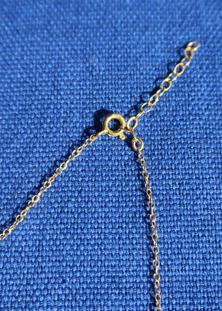 14k gold-plated sterling silver mini cross necklace with a freshwater pearl handmade in Greece. Greek jewelry. Spring ring clasp and extender