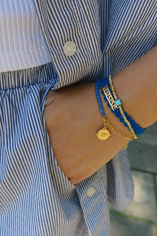 Bracelets made in Greece. Evil eye bracelet with gemstones, gold-plated jewelry, Greek Key bracelet.