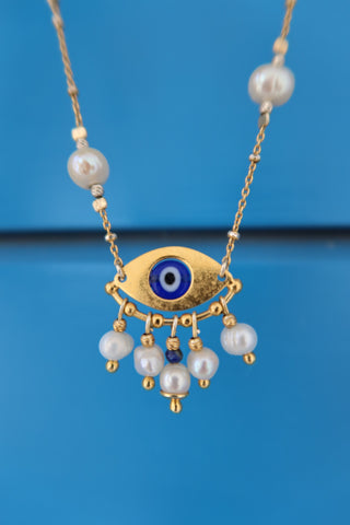 Evil Eye Necklace. Greek protection jewelry. Gold and pearl evil eye (nazar) necklace made in Greece.
