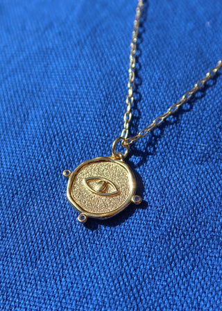 Gold-plated sterling silver 925 evil eye pendant necklace with blue zircon stones by Barbora Jewelry, Greek designer brand. Greek jewelry, evil eye necklace made in Greece, semi-fine jewelry, handmade jewelry for protection