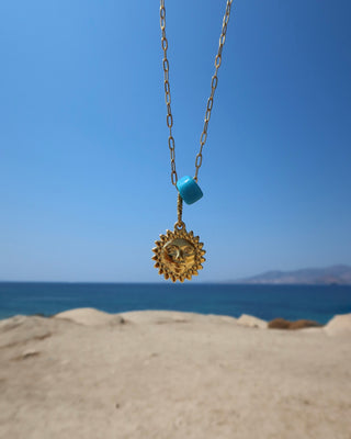 Sun Pendant Necklace with Blue Bead