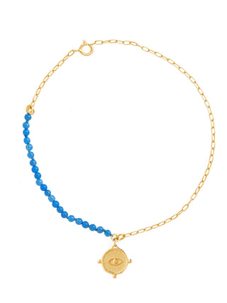 Gold-plated silver 925 and blue agate gemstone evil eye bracelet with an eye charm, made in Greece by Barbora Jewelry, a Greek jewelry designer.