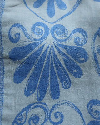 Blue cotton beach towel with white Anthemion floral pattern