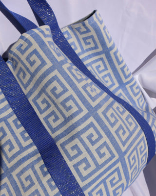 close up of Blue and white greek key print beach bag with metallic straps 100% cotton made in Greece