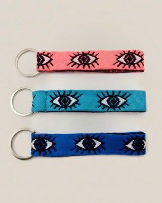 3 evil eye woven lanyard key rings in coral, turquoise, and blue made in Greece. Greek evil eye keychain wrist strap