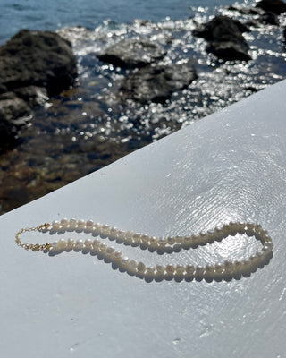 Freshwater pearl necklace photographed at the beach in Greece
