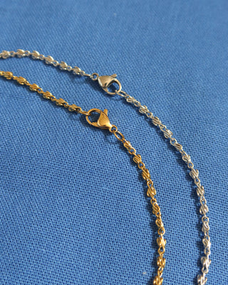 gold and silver s-link infinity chain necklaces with lobster claw clasps