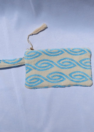 Light blue eye wave print wristlet clutch bag made in Greece. 100% cotton zippered pouch made by Greek designer artisans