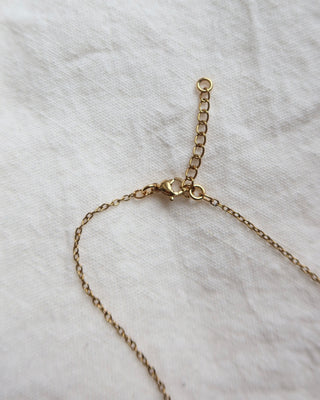 Lobster clasp closure with extender on a gold chain