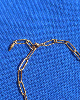 gold paperclip chain bracelet with lobster claw clasp