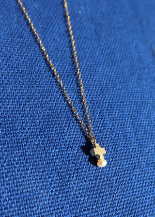 14k gold-plated sterling silver mini cross necklace with a freshwater pearl handmade in Greece. Greek jewelry