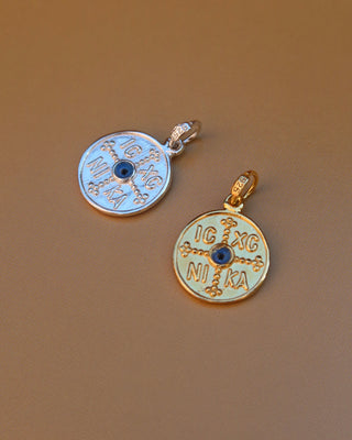 Silver and gold round pendants with IC XC NI KA with evil eye mati on the other side made in Greece, Greek Orthodox religion pendants
