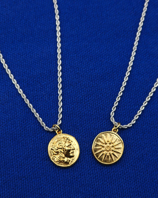 Two-tone necklace with a silver rope chain and a gold pendant featuring Alexander the Great on one side and a vergina sun symbol on the other. Reversible Greek necklace, Greek jewelry made in Greece