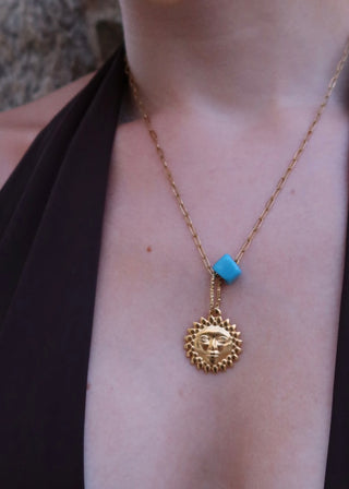 Sun Pendant Necklace with Blue Bead