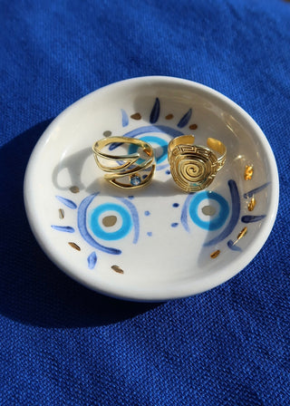 Ceramic evil eye trinket dish hand painted with blue and gold evil eye design. Small plate made in Greece to store jewelry and other small objects on for home decor, room decor, Mediterranean aesthetic decor and Greek gifts