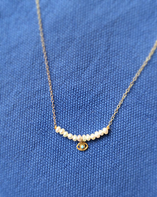 gold-plated sterling silver 925 necklace with an evil eye charm with a turquoise accent and freshwater pearls handmade in Greece. Greek evil eye jewelry