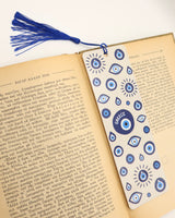 Bookmark with blue evil eye pattern and blue tassel made in Greece. Greek mati bookmark