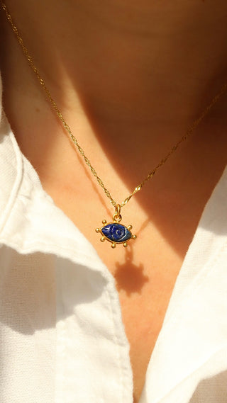Gold-plated sterling silver 925 necklace with a lapis lazuli gemstone evil eye pendant on a twisted Singapore chain made in Greece. Greek protection jewelry