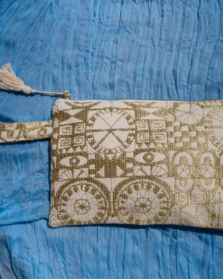 Cotton clutch bag handcrafted in Greece. Metallic gold printed clutch bag zippered pouch with wrist strap and a tassel on the zipper closure. Wristlet bag Greek fashion