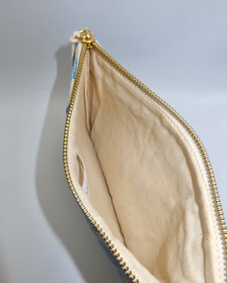 Cotton canvas interior of woven clutch bag. Wristlet made in Greece