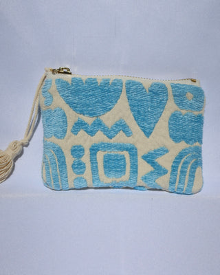 Small coin pouch wallet with turquoise geometric pattern and tassel handcrafted in Greece.