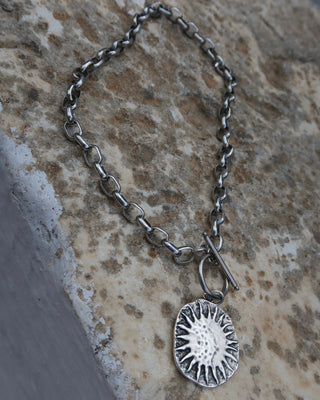 Chunky silver toggle front necklace with a sun pendant made in Greece, Greek jewelry