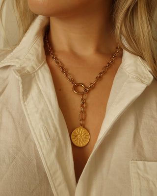 Gold chain necklace with a vergina Sun round pendant on a chunky chain lariat Y necklace made in Greece. Ancient Greek jewelry